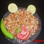 Sprouted chana (chickpeas) with lemon, tomato and green chilli — a high-protein Indian food for belly fat reduction